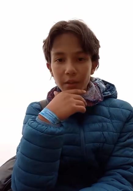 Video still of Paolo Sánchez Carrasco, a 14-year-old boy, shortly before he died of hypothermia while climbing a volcano.