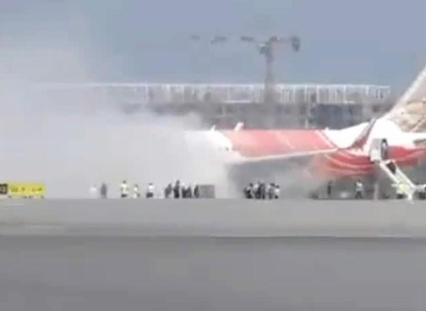 Air India passenger plane catches fire on runway in SECOND airline panic in 24hrs just weeks on from crash disaster