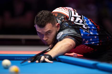 Billy Thorpe of Team USA playing pool.
