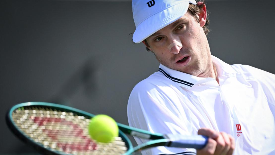 Why does Nicolas Jarry wear a plaster on his nose?