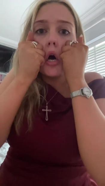 Close-up of a pregnant woman expressing anger.
