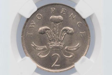 Close-up of a rare two-pence coin.