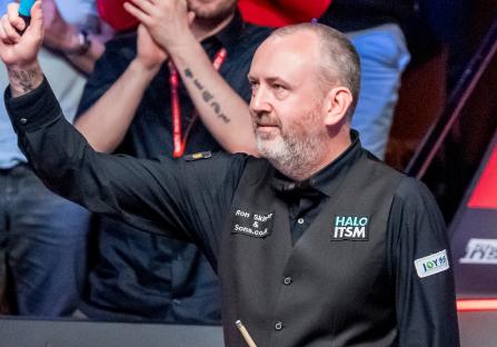 Mark Williams celebrating a snooker victory.
