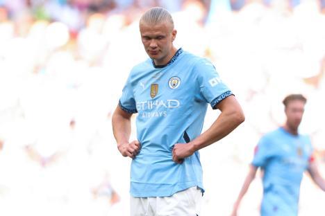 Erling Haaland of Manchester City looking dejected.
