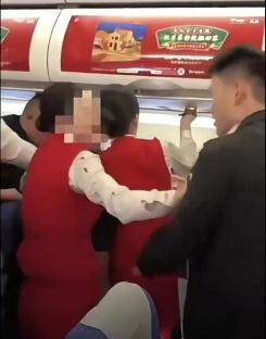 Watch shocking moment crazed passenger ‘BITES’ flight attendant during mid-air meltdown over ‘body odour’
