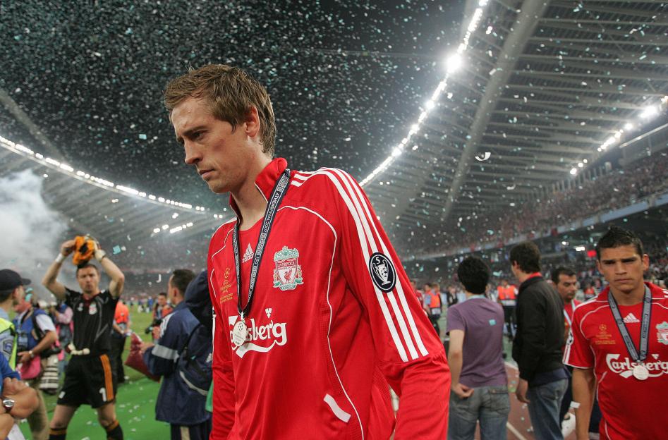Peter Crouch and Steven Gerrard celebrating a Liverpool goal.