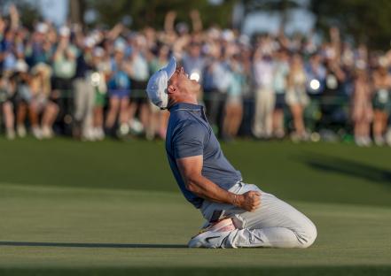 Rory McIlroy celebrating a golf victory.