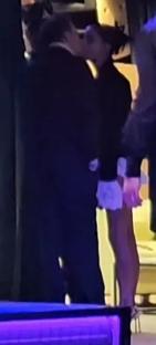 Maura Higgins and Danny Jones kissing at a Brit Awards after-party.