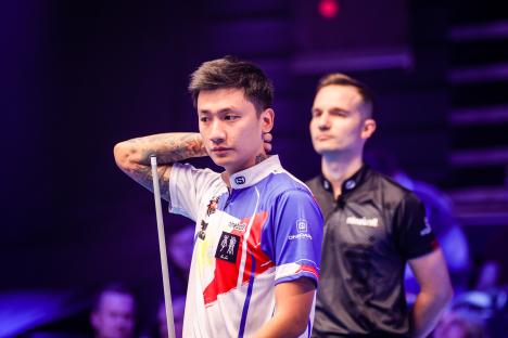 James Aranas of the Philippines reacts during a snooker semi-final match.