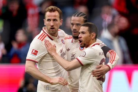 Bayern Munich players celebrating a goal.