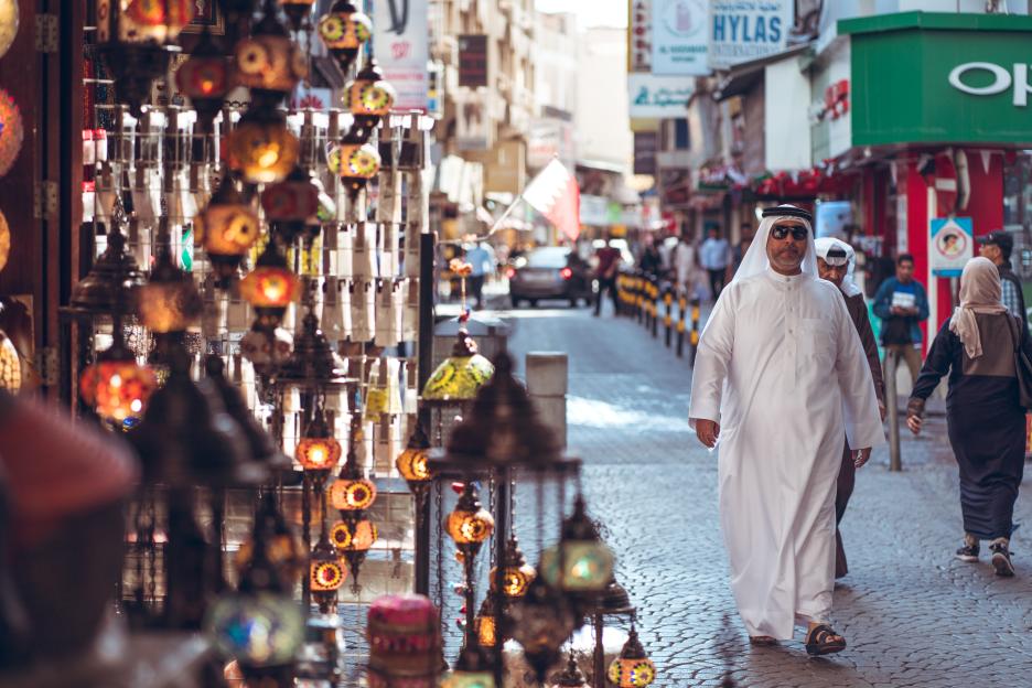 Muslim people shopping in a Bahraini souq.