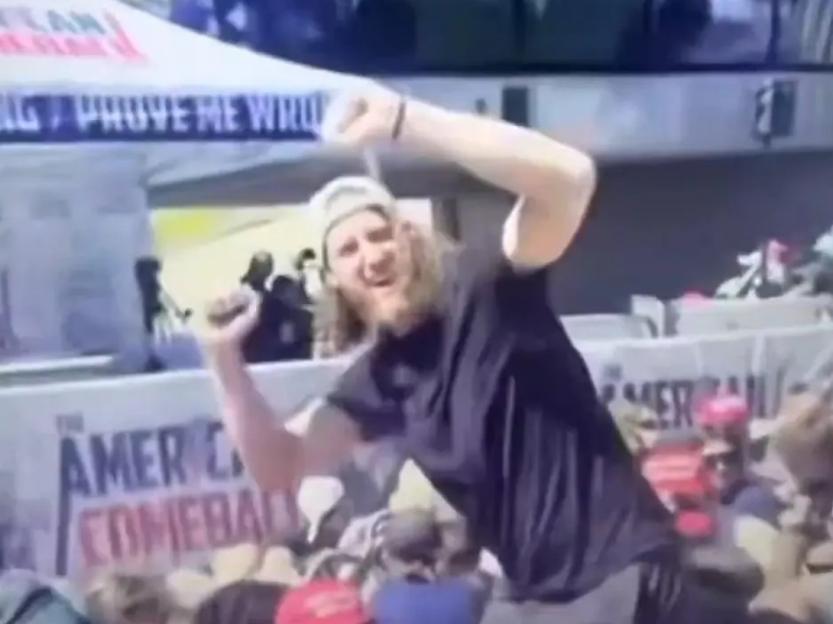 Viral bearded man seen CHEERING after Charlie Kirk shot dead breaks silence and reveals why he screamed ‘USA, USA’