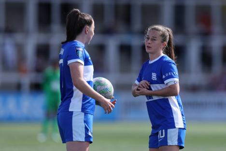 Christie Harrison-Murray of Birmingham City and Lucy Quinn during a soccer match.