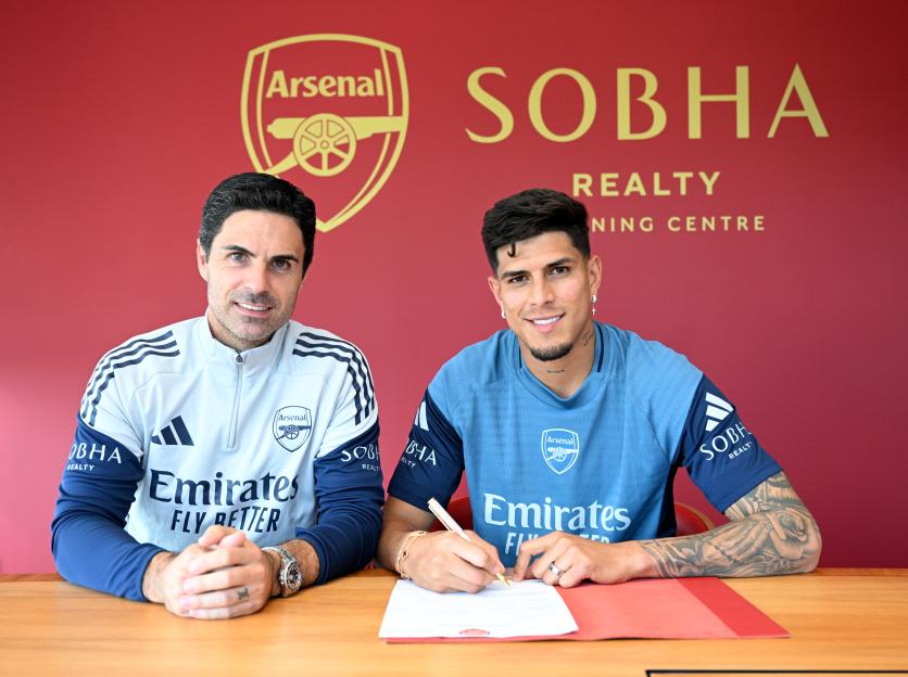 Mikel Arteta and Piero Hincapie at Arsenal signing.