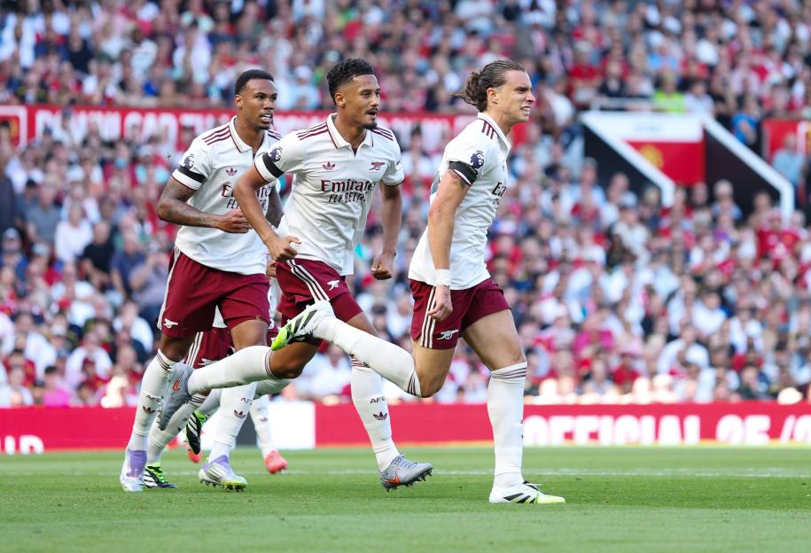 Arsenal players celebrating a goal.