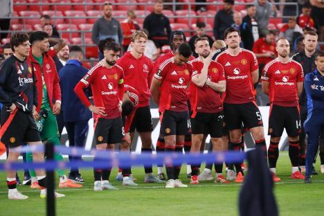 Dejected Manchester United players after a soccer match.
