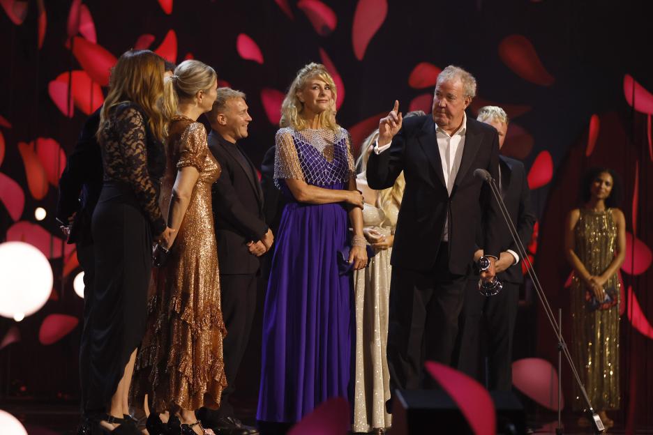 The cast of Clarkson's Farm accepting an award.