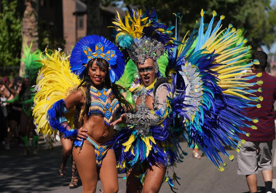 Dancers in elaborate costumes at the Notting Hill Carnival.
