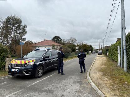 French gendarmes securing a street after a kidnapping.