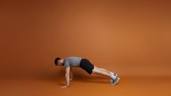 Man performing a plank exercise.