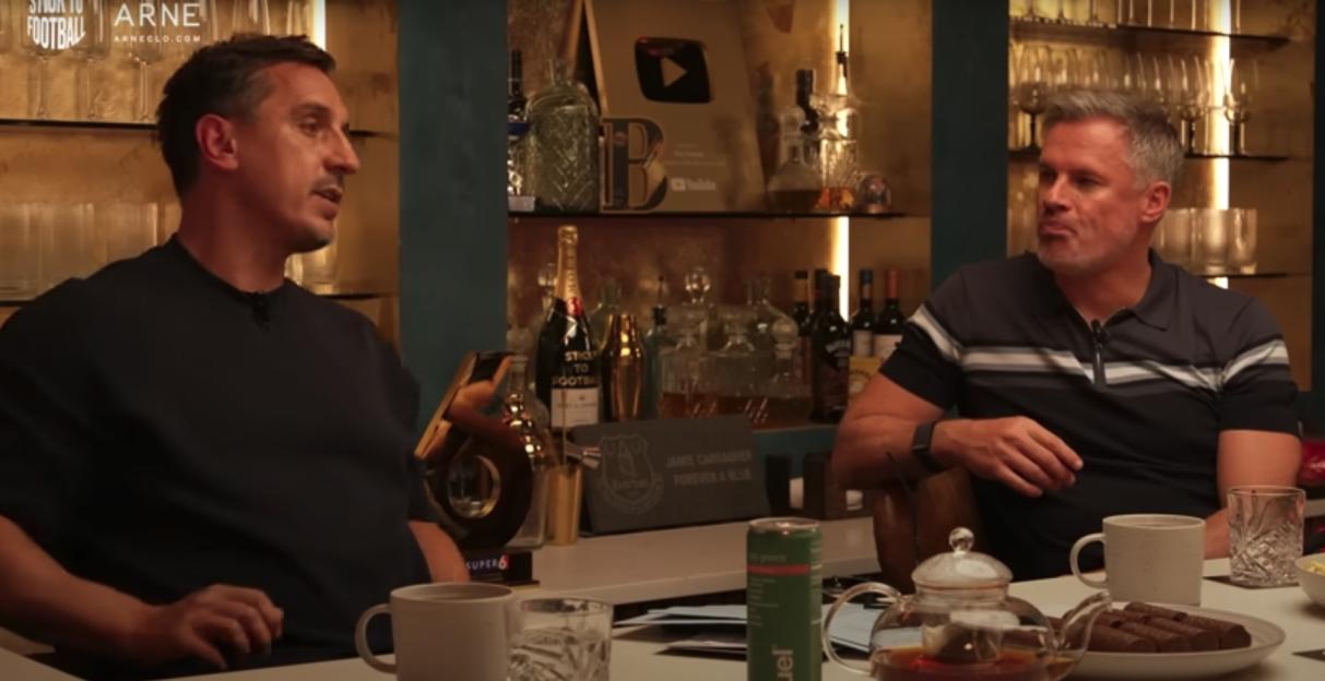 Two men in conversation at a bar.