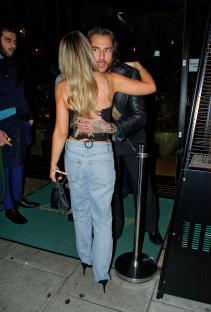Pete Wicks and Samantha Kenny embracing outside a club.