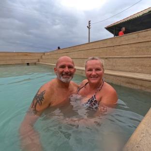 Couple relaxing in a hot spring.
