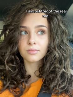 Woman with curly brown hair and orange shirt, text overlay: