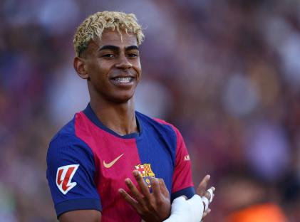 Lamine Yamal of FC Barcelona celebrates scoring a goal.