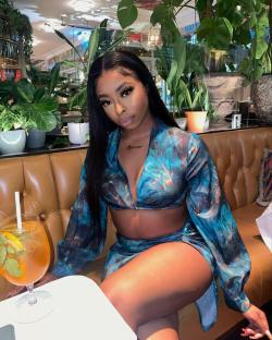 Catherine Agbaje, Love Island contestant, in teal outfit.