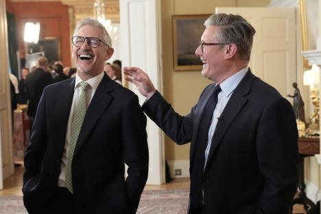 Keir Starmer and Gary Lineker laughing at a St. George's Day reception.