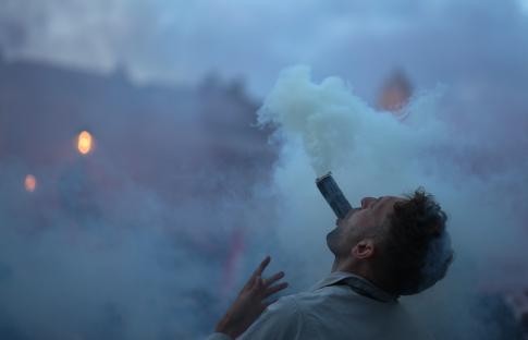 Sunderland fan igniting a flare in Trafalgar Square.