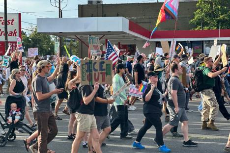 Victim of shooting at ‘No Kings’ demonstration in life-threatening condition as cops confirm they have three in custody