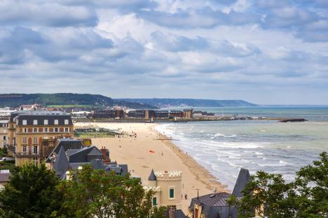 Aerial view of Trouville-sur-Mer beach and buildings.