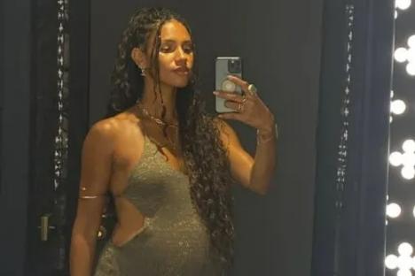 Pregnant Vick Hope shows off her baby bump in mini dress as she parties at husband Calvin Harris’s Ibiza club gig