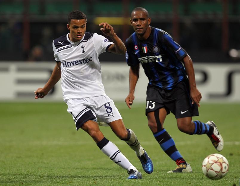 Jermaine Jenas of Tottenham Hotspur challenged by Maicon of Inter Milan.