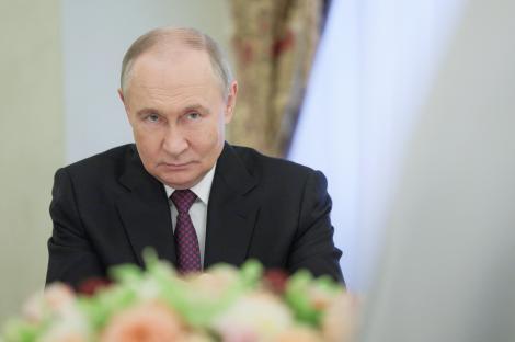 Vladimir Putin at a meeting.