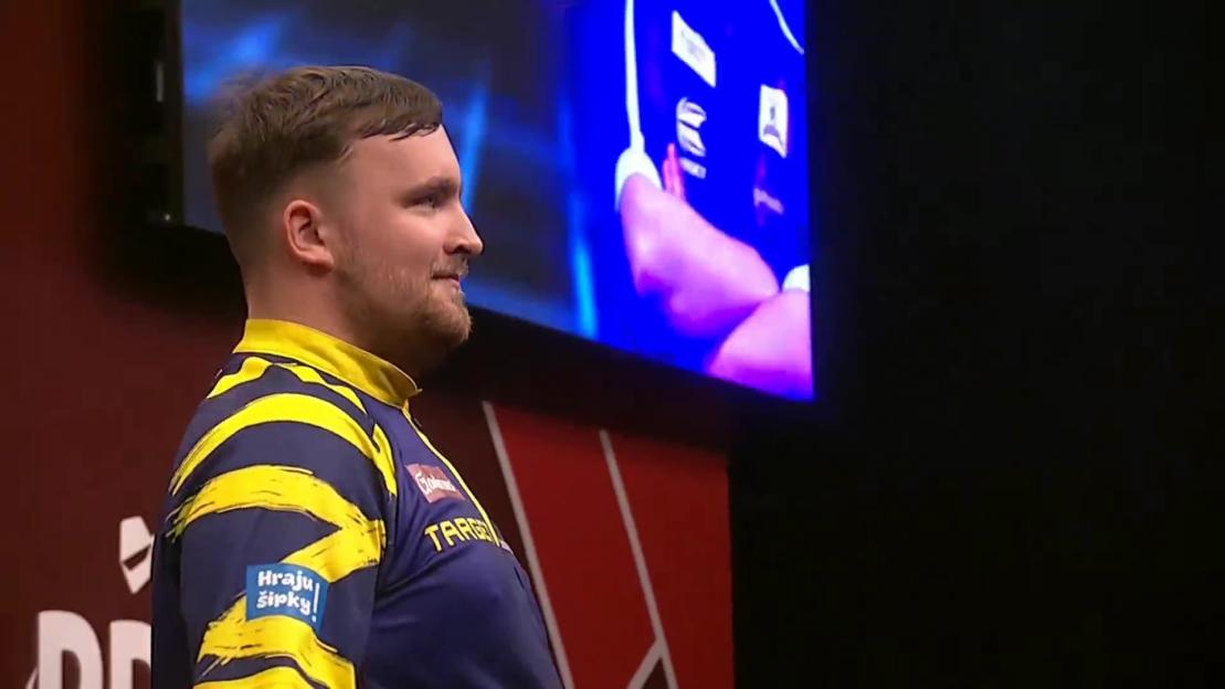 Luke Littler at a darts tournament.