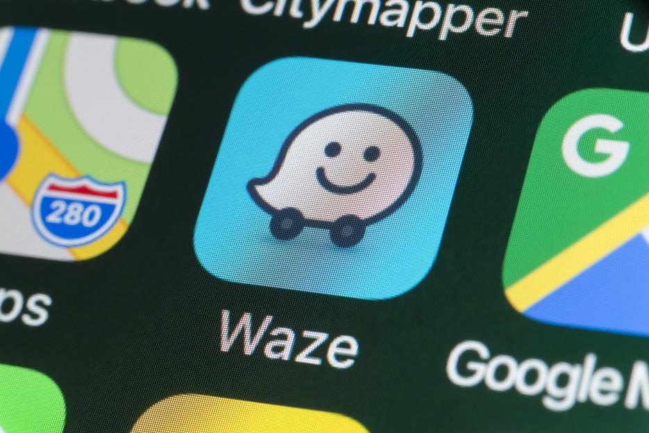 Waze app icon on an iPhone screen.