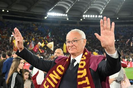 Coach Claudio Ranieri celebrating at a soccer match.