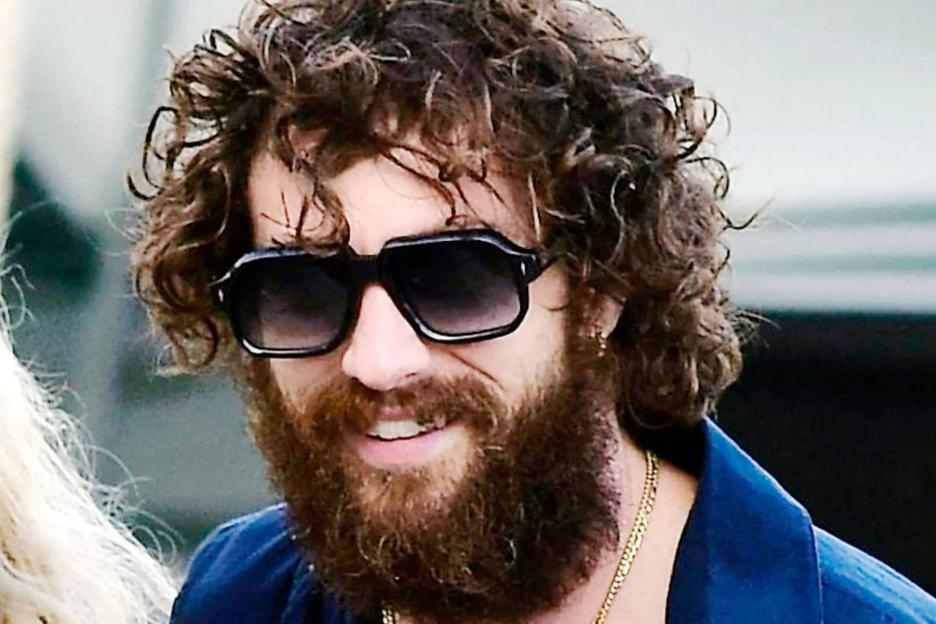 Brit actor looks unrecognisable with big bushy beard as he holidays with Elton John and David Furnish