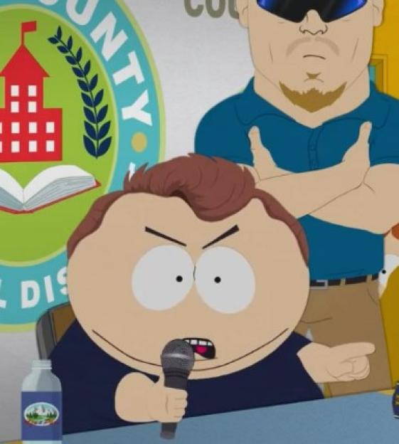 South Park depiction of Charlie Kirk speaking into a microphone.
