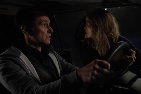 Matthew Rhys and Rosamund Pike in a film still.