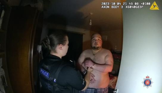 Bodycam footage of a police officer arresting a man.