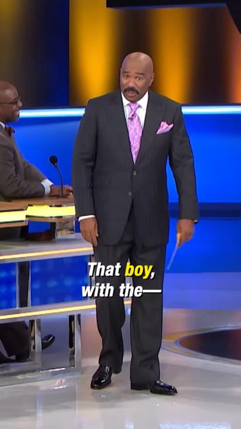 Steve Harvey on Family Feud reacting to a contestant.