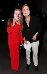 Couple at Kevin De Bruyne's leaving party wearing masks of the footballer.