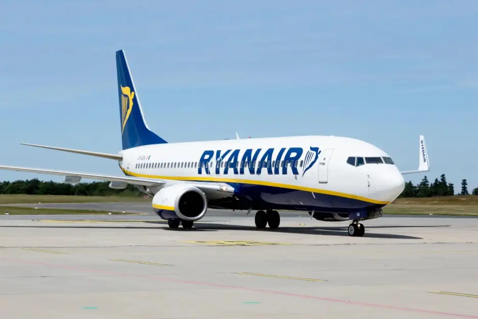 A Ryanair Boeing 737-800 aircraft on an airport tarmac.