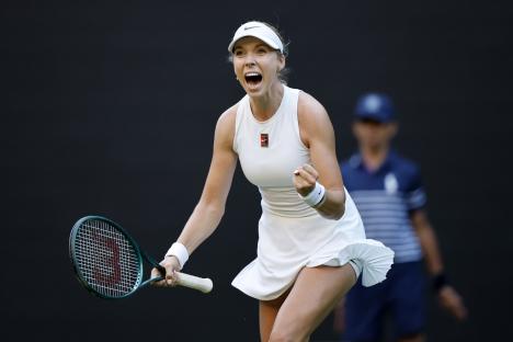 Katie Boulter of Britain celebrates winning a point at Wimbledon.