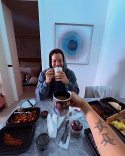 Man and woman enjoying breakfast together.