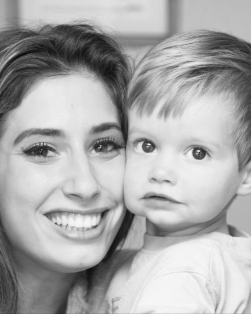Black and white photo of a woman and young child.